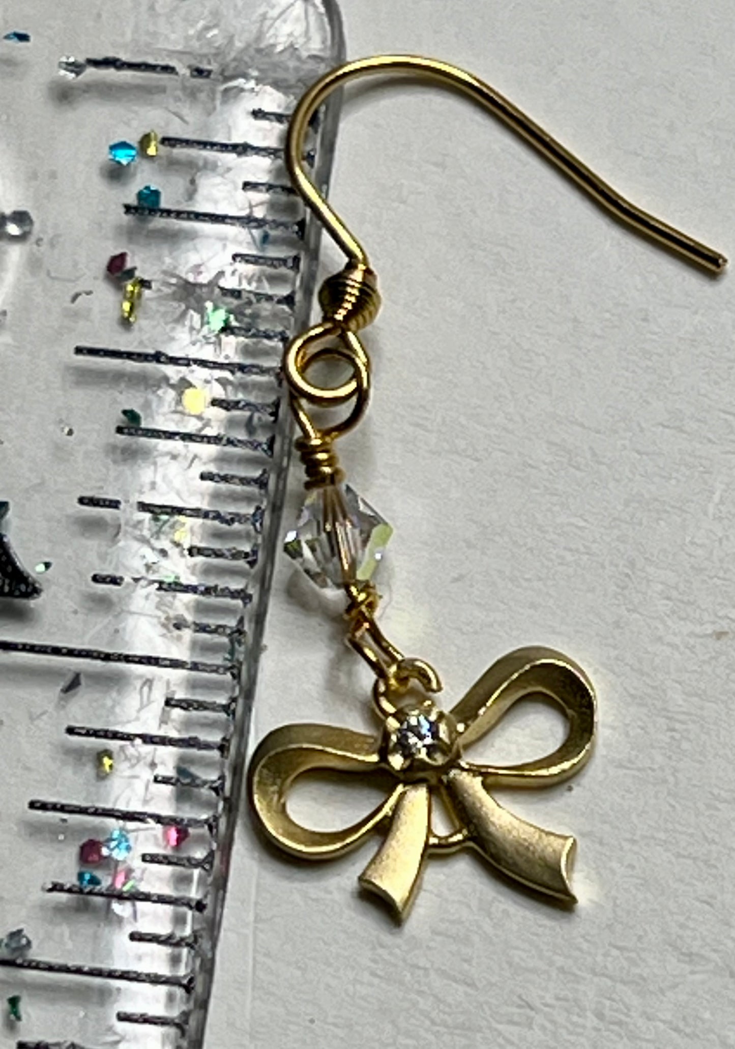 Dangling Bow with CZ and a SW Crystal Gold Plated Earrings